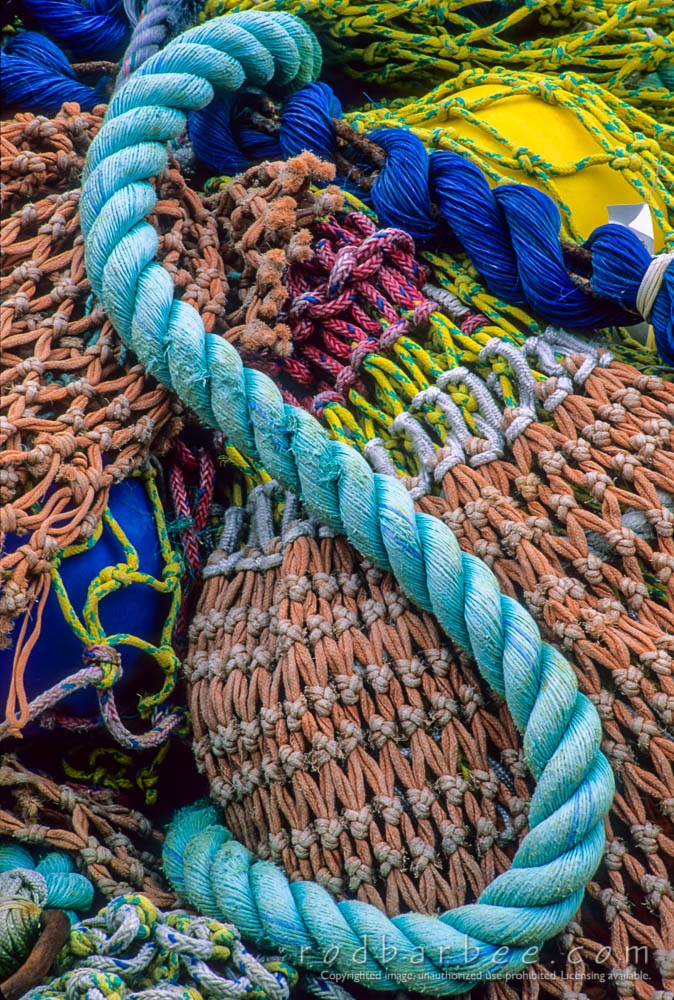 curve of rope on pile of nets